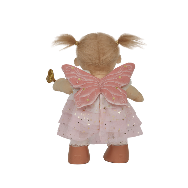 doll wearing white and gold fairy costume