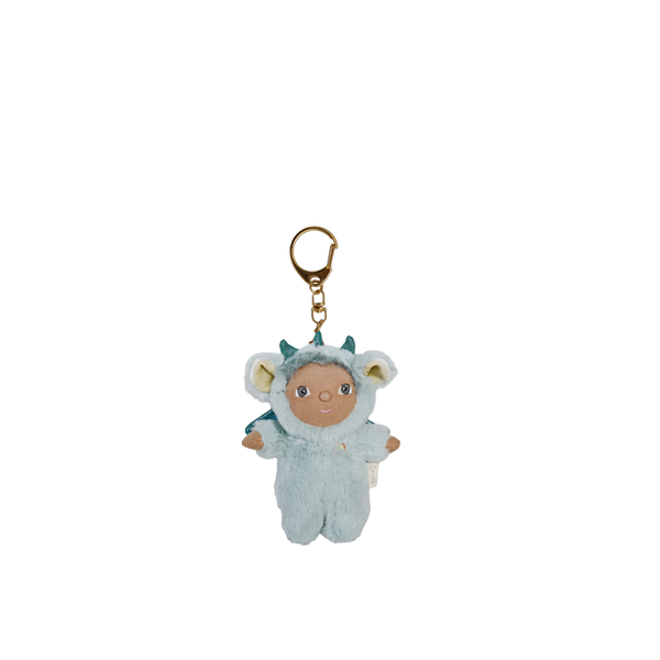 Plush keychain of a baby in a blue outfit with a gold ring on a white background