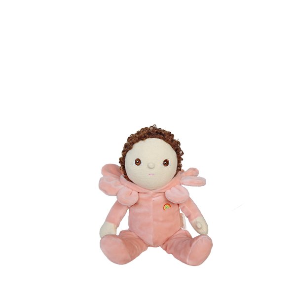 Plush toy with a baby-like face and curly hair on a white background
