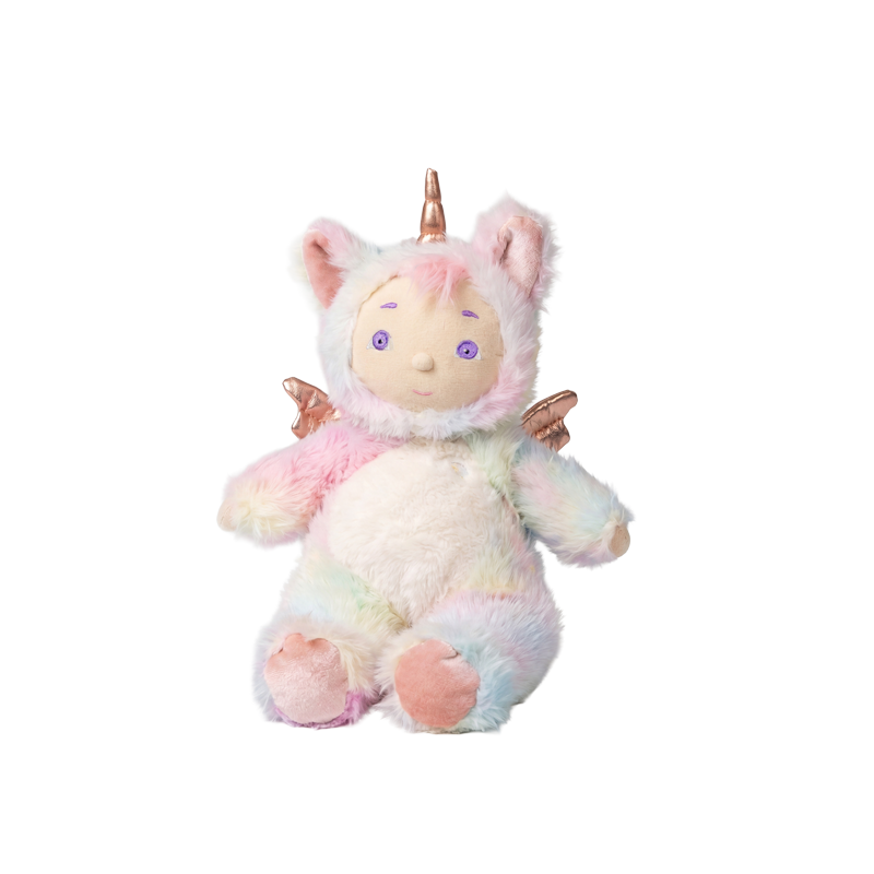 Cozy Dinkums Sunbeam plush unicorn doll with pastel rainbow fur soft wings and pink feet seated against a plain background