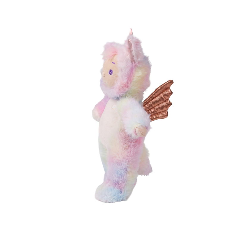 Pastel pink and white Cozy Dinkums plush unicorn with soft rainbow accents and textured brown wings shown in side profile