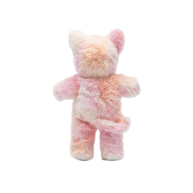Back view of Cozy Day Dinkums Kittycorn Pompom plush toy with soft pastel pink and cream fur pointed ears outstretched arms and a curled tail