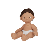 Plush baby doll with brown hair