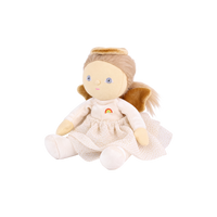 Plush doll dressed as an angel, with fluffy light-brown hair in pigtails, embroidered blue eyes, a gold velvet halo and wings, a cream velvet top with a small rainbow patch, a cream tulle skirt with gold glitter dots, and cream booties.