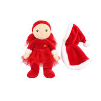 Plush doll with red hair, embroidered green eyes and rosy cheeks, wearing a red velvet hooded cape with white fluffy trim over a red outfit with a tulle skirt, white fluffy cuffs and a small rainbow patch on the chest.