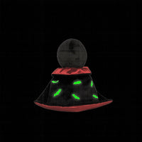 Stuffed toy with a black glow in the dark hood and red trim on a white background