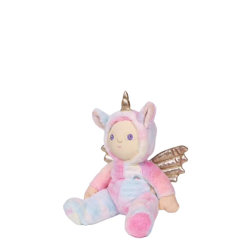 Dinky Dinkums Yara Unicorn plush doll with pastel pink and blue fur a golden horn soft wings and a sweet embroidered face sits against a white background