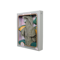 Packaged green towel with decorative elements on a white background