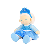 Plush doll with white hair, blue eyes and rosy cheeks, wearing a blue velvet tiara, a sequinned blue dress with sheer sparkly sleeves and a tulle skirt, white frilled socks, light blue shoes, and a blue heart-shaped bag with an embroidered snowflake.