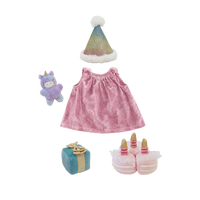 Set of children's items including a pink dress, Santa hat, plush toy, gift box, and shoes on a white background.