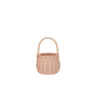 Rose rattan berry basket with a sturdy rounded handle for collecting small treasures during imaginative play by Olli Ella Home