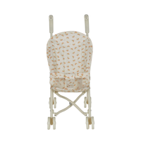 Small white stroller with rainbow patterns on a white background