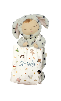Tote Bag with multi coloured prints and a plush doll