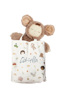 Tote Bag with multi coloured prints and a plush doll