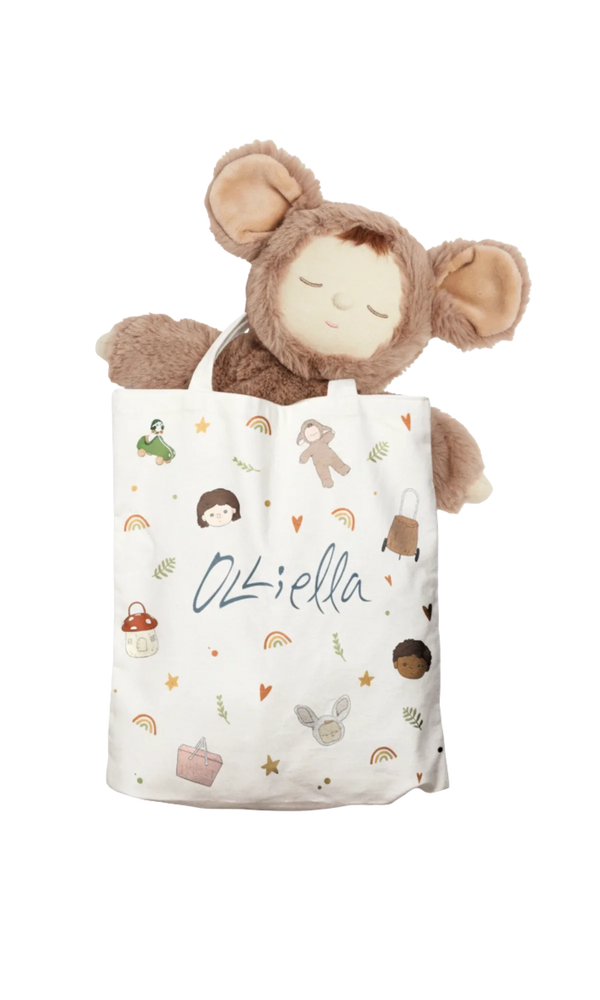 Tote Bag with multi coloured prints and a plush doll