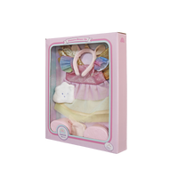 Packaged baby girl's clothing set with pink headband, dress, and shoes on a white background