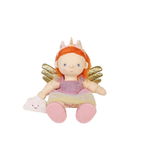 Plush toy fairy with red hair, gold wings, and a pink dress on a white background