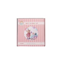 Dinkum Dolls Happy Birthday set packaging with a striped design and doll illustration on a white background.