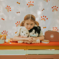 Olli Ella Dinkum Dogs Lucky and Cookie with child