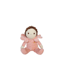 Plush toy with a baby-like face and curly hair on a white background