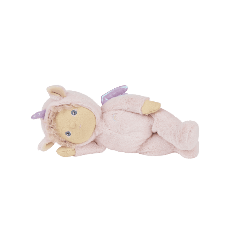 Soft pink Dinky Dinkums unicorn doll with a cream face purple horn and floppy ears shown lying down