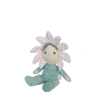 Plush toy resembling a baby with flower-like design on a white background
