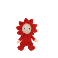 Red plush toy with a flower design on a white background