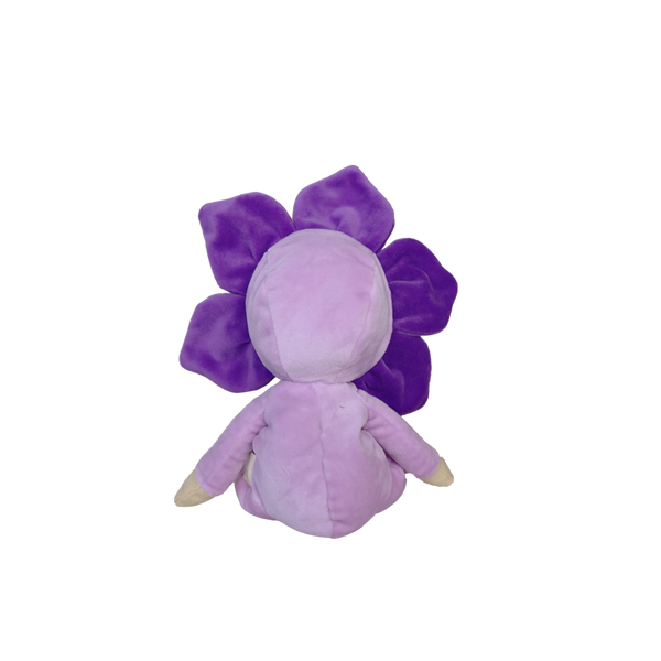 Purple plush toy with flower-like design on a white background