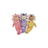 Three soft Dozy Dinkums dolls in pink lavender and yellow flower bonnets with embroidered sleeping faces posed together for imaginative play