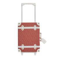 Sweetheart red See Ya suitcase with a white telescopic handle and playful dotted pattern by Olli Ella Kids