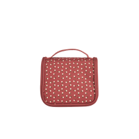 Sweetheart red wash bag with a top handle and playful cream heart pattern for kids travel from Olli Ella Kids