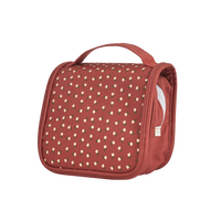Sweetheart red kids wash bag with a playful repeating heart pattern top handle and side carry strap for travel by Olli Ella Kids