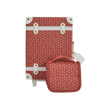 Sweetheart red See Ya wash bag with white trim and a matching patterned suitcase behind it from Olli Ella Kids