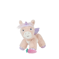 Plush pink unicorn toy with lilac wings and horn beside a pink and green magnetic carrot accessory from Dinkum Pets