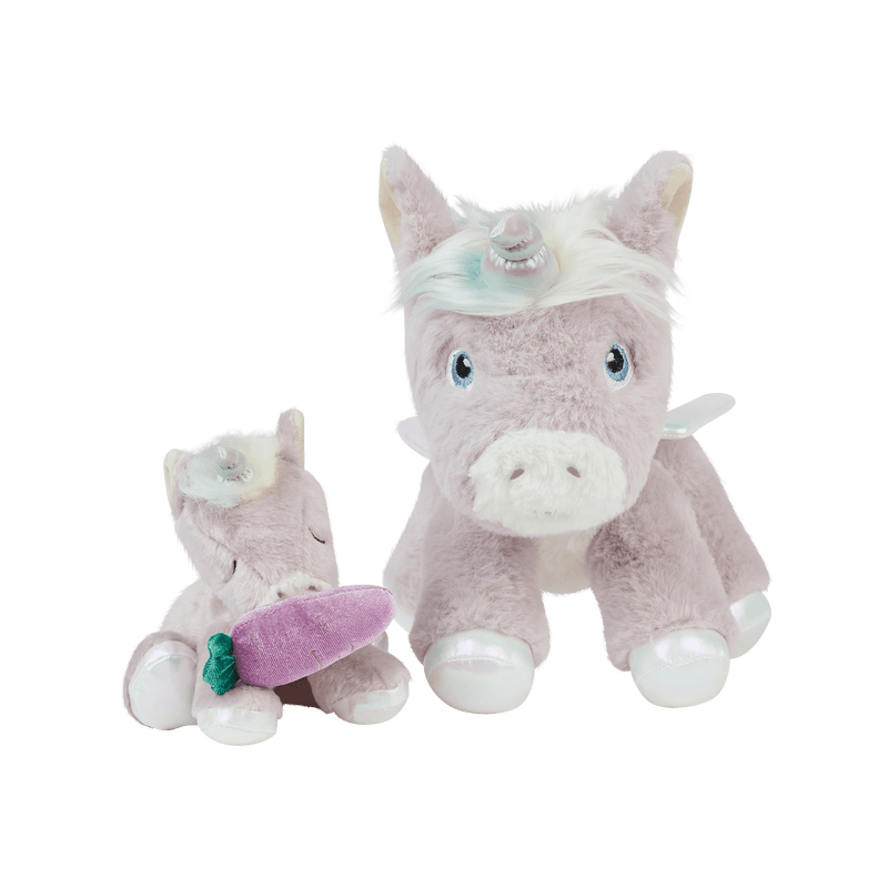 Dinkum Pets plush unicorns playing with a purple magnetic carrot accessory for imaginative snacking and open ended play
