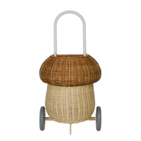 Olli Ella natural two tone rattan mushroom luggy basket with a rounded cap white pull handle and two wheels for imaginative play