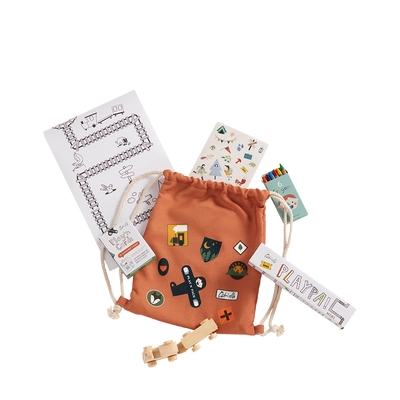 Playpa Forest activity backpack with woodland patches surrounded by coloring sheets colored pencils a ruler and wooden craft pieces for imaginative travel play