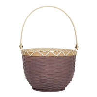 Small berry coloured bamboo basket with a woven body, decorative natural trim and a long carry handle, designed for collecting treasures by Olli Ella Kids Rattan