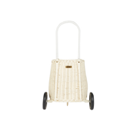 Chalk rattan Luggy basket with an arched handle and two wheels for toddlers to carry toys and treasures by Olli Ella Kids Rattan