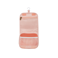 Open pink kids wash bag with a hanging hook and coral lined mesh pocket for organising toiletries on sleepovers and family travels by Olli Ella Kids